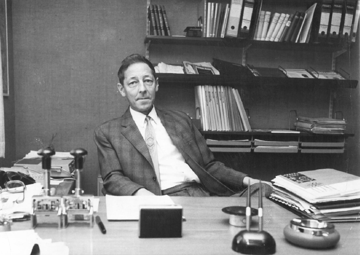 Madsen at his office desk